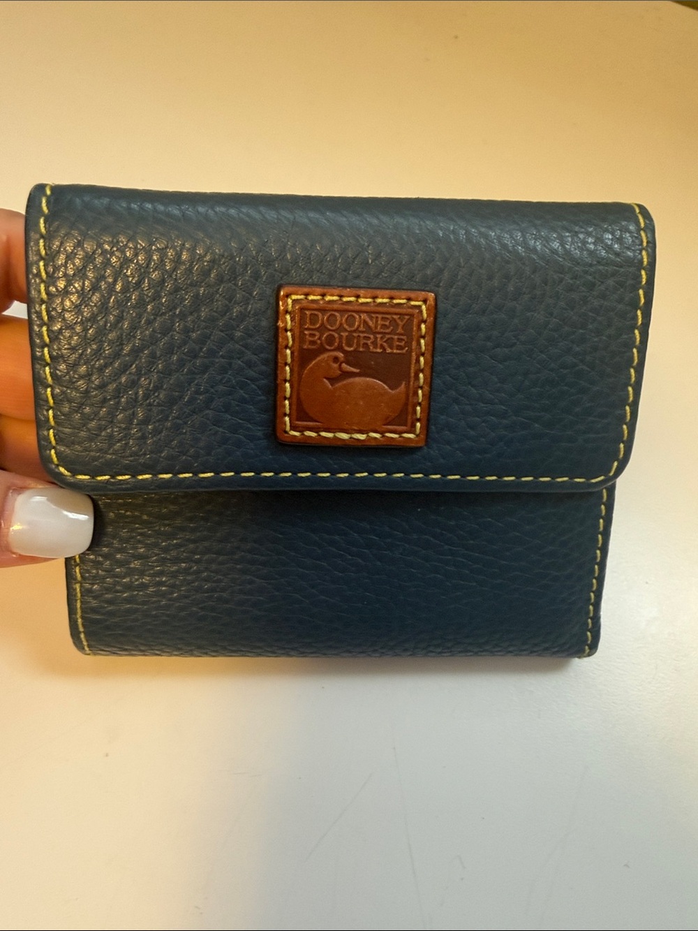 Dooney & Bourke Navy Pebbled Leather Bifold Wallet with Yellow Stitching